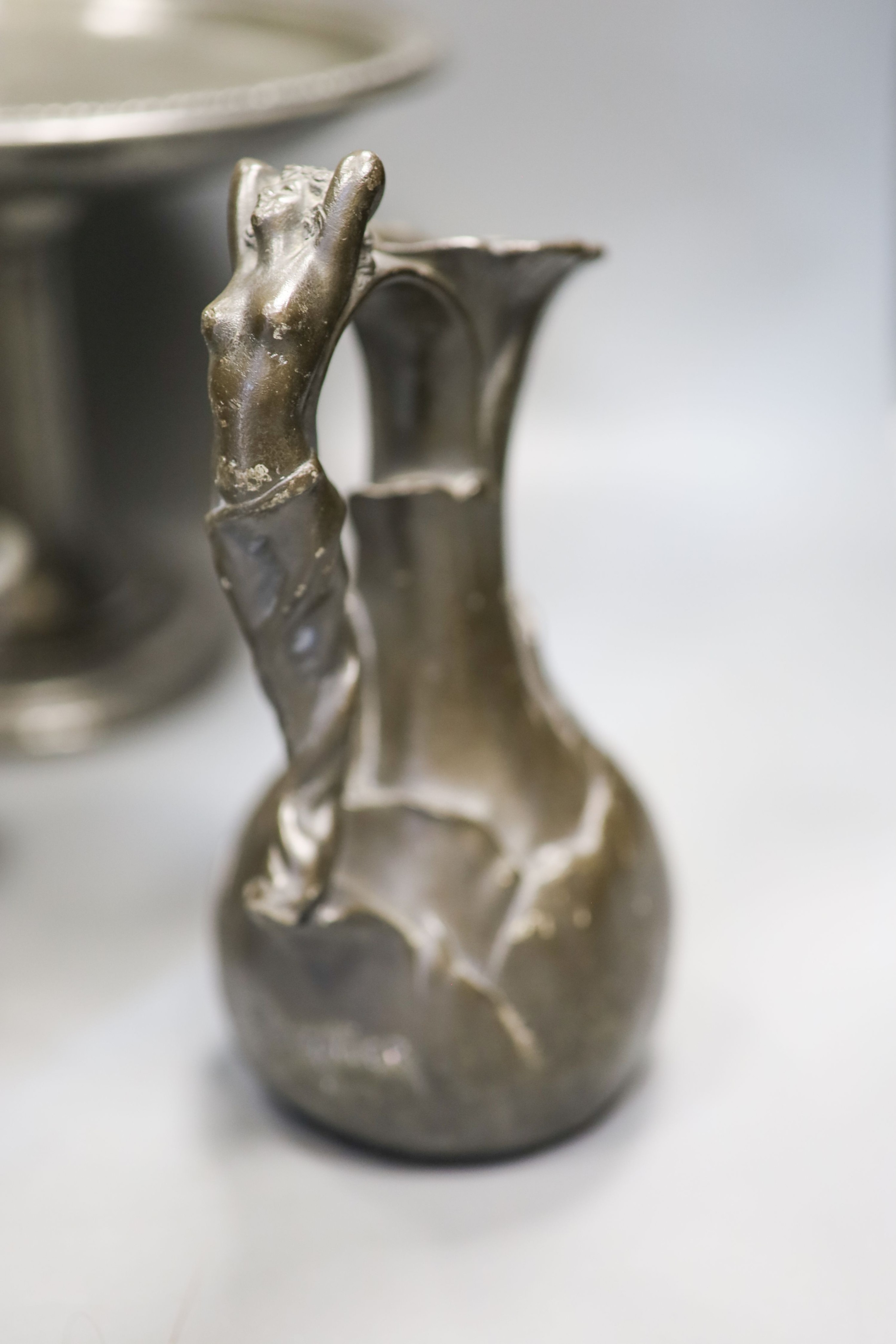 J Garnier - cast pewter jug in Art Nouveau style, Two Liberty's Tudric hammered pewter items and two other pewter wares